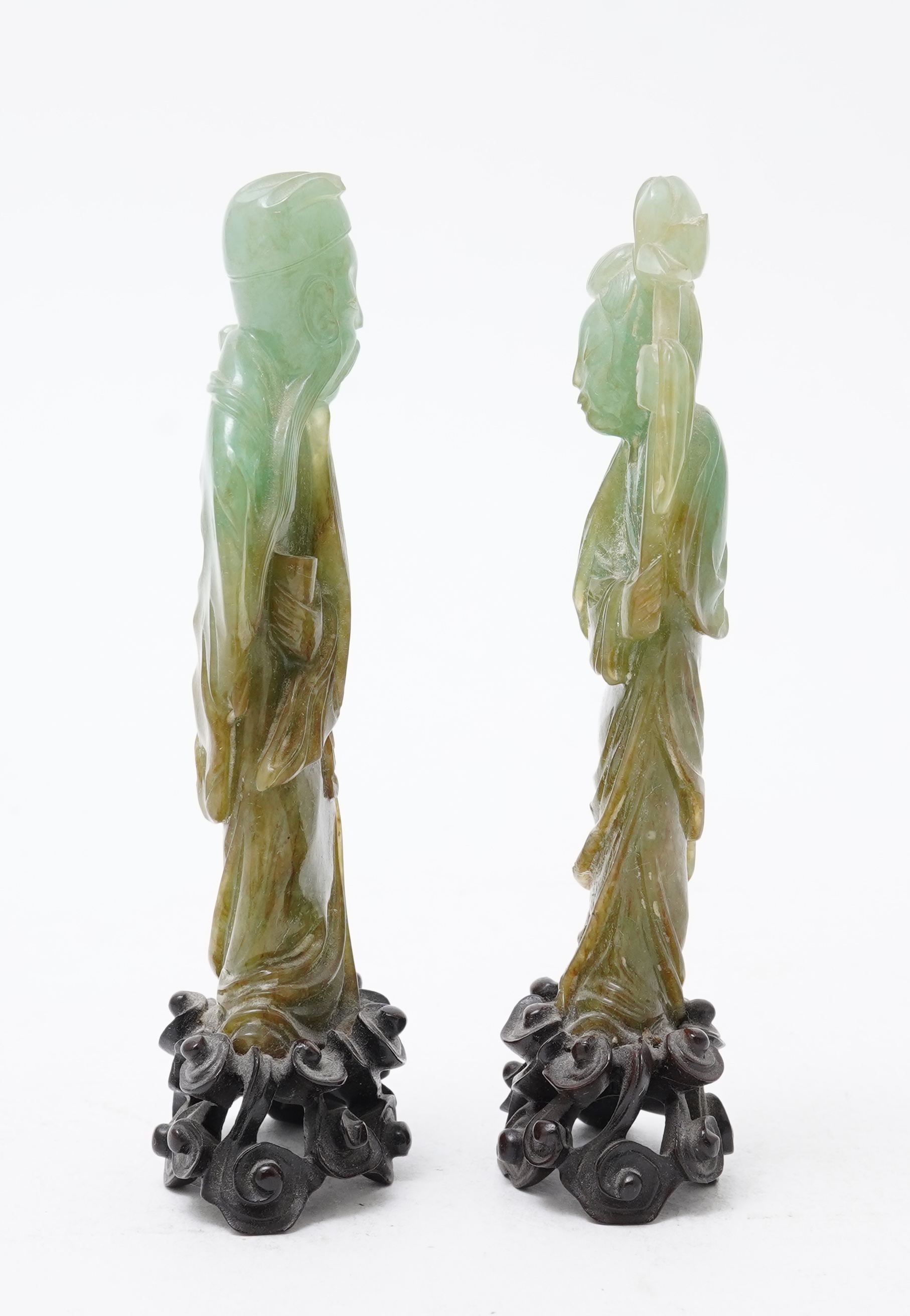 Possibly retailed by Cartier, a pair of Chinese jadeite figures, early 20th century